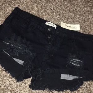 Shop Impressions distressed jean shorts!